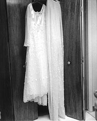 Wedding Dress hanging in readiness