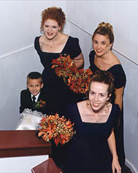 Bridesmaids and Ring Bearer Coming Up the Stairs